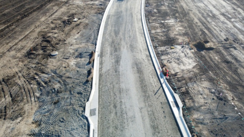 an aerial view of a road and construction area.